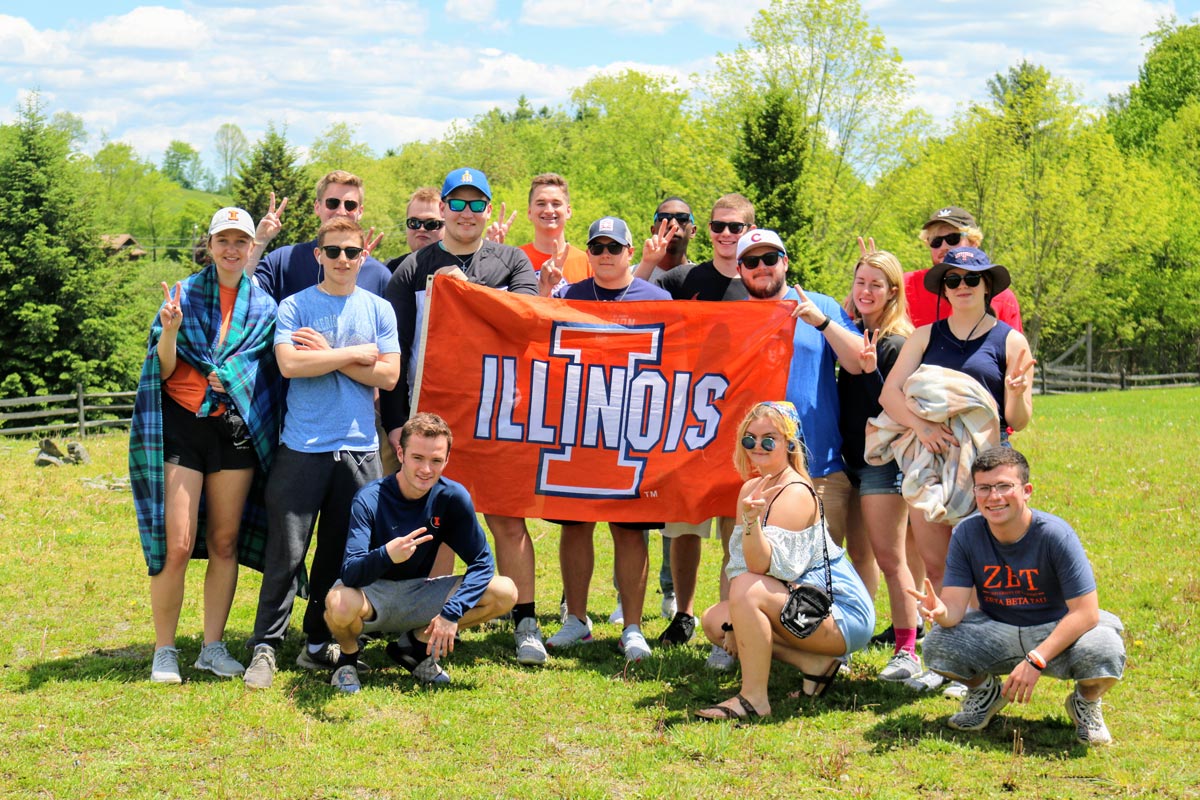 the RST class posing together with an Illinois flag