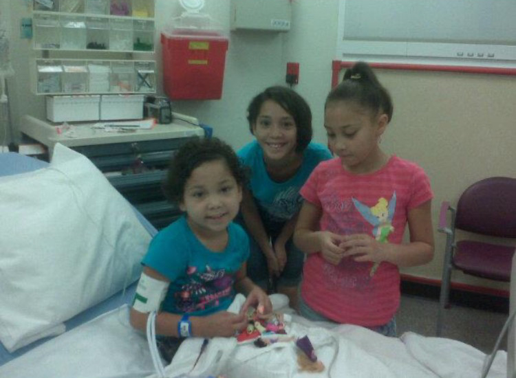 Nariah with her sister in the hospital